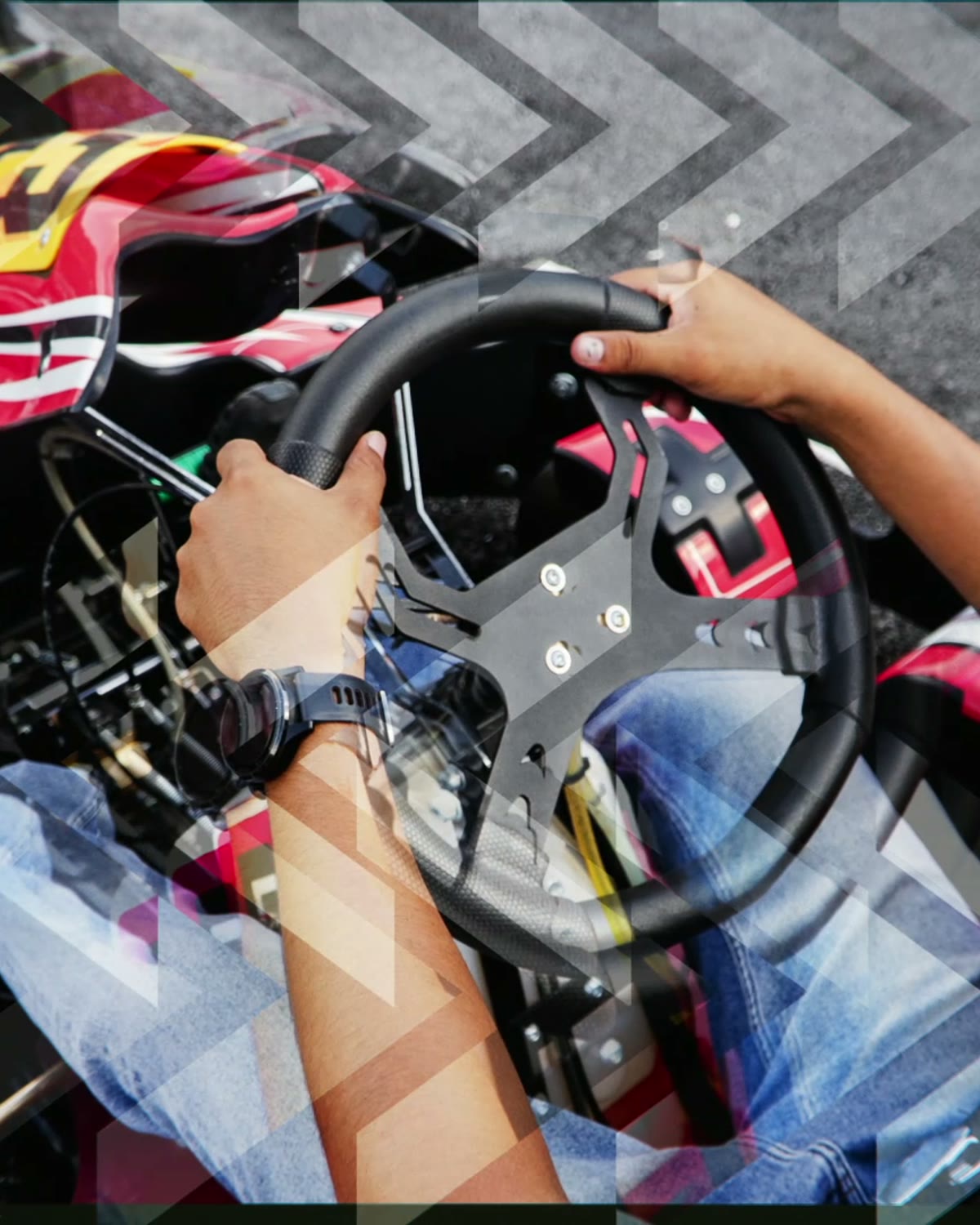 Driver holding the steering wheel in a Go Kart at International Phuket Kart